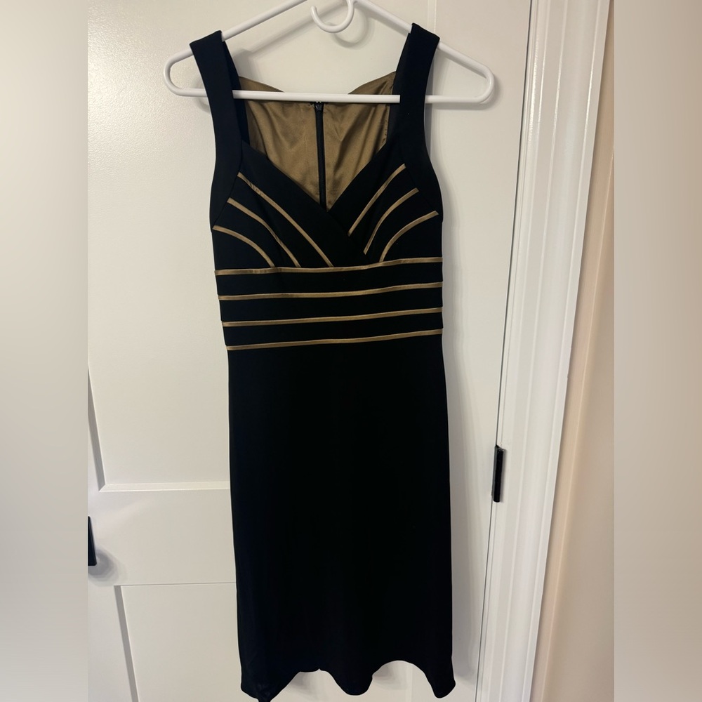 Stylish V-neck black dress!  Size 2